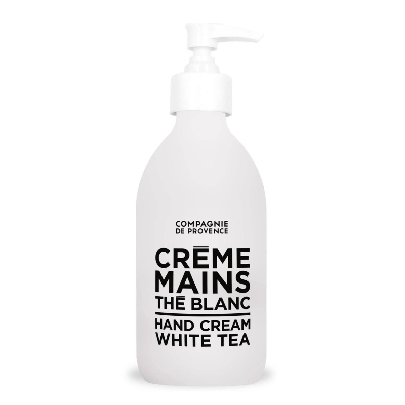 Eine weiße Flasche Handcreme mit Pumpspender, beschriftet mit 'Compagnie de Provence Creme Mains The Blanc Hand Cream White Tea'.