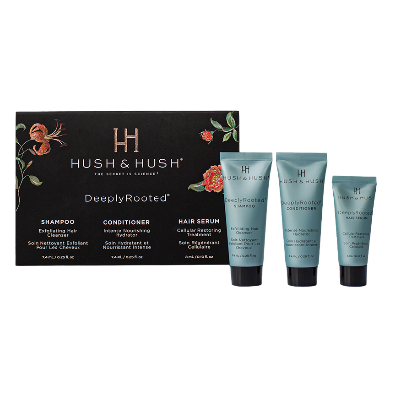 Hush & Hush DeeplyRooted Trial Set: Shampoo, Conditioner und Haarserum in blauen Tuben vor schwarzer Verpackung.