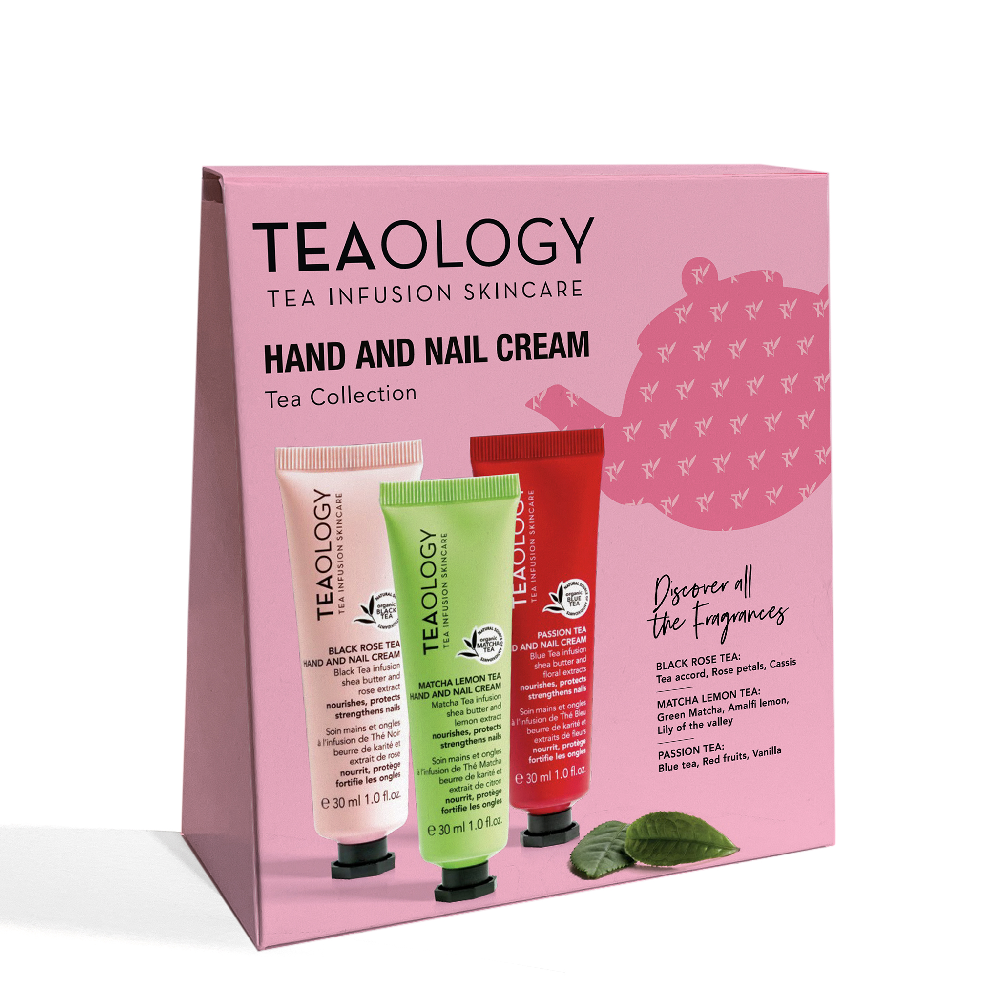 8050148505648_1-T50564-Hand-Cream-Collection Drei Hand- und Nagelcremes von Teaology in einer rosa Verpackung mit Teeblättern und Duftbeschreibungen.
