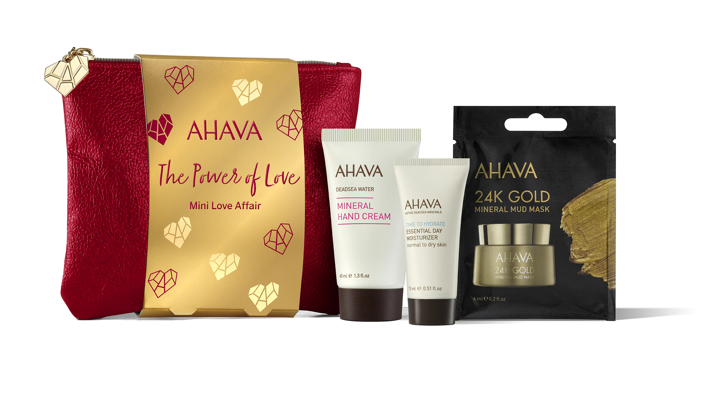 0697045015092 AHAVA Geschenkset mit roter Tasche, Handcreme, Körpercreme und 24K Gold Schlammmaske.