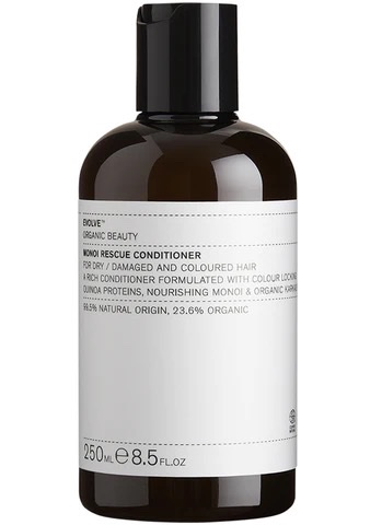 Braune Flasche mit Etikett 'Evolve Organic Beauty Monoi Rescue Conditioner' für trockenes und geschädigtes Haar, 250 ml.